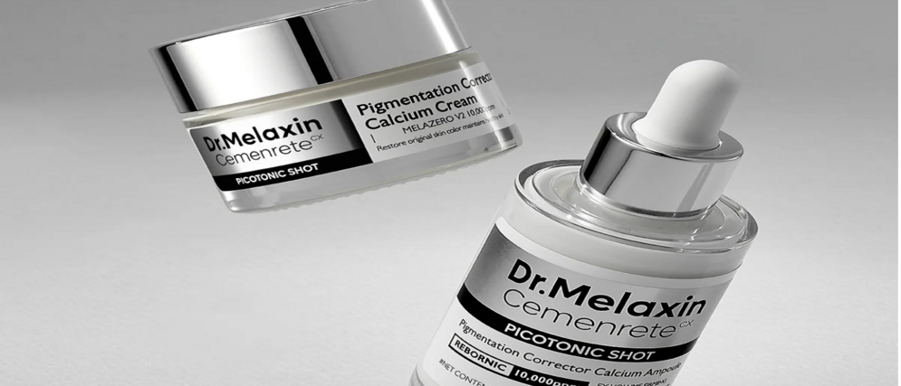 Zwei Dr. Melaxin Cemenrete CX Produkte – eine Pigmentation Corrector Calcium Cream im Tiegel und ein Picotonic Shot Serum mit Pipette vor grauem Hintergrund.